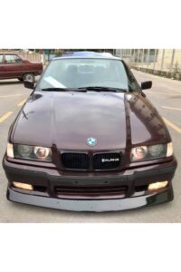BMW kar van with Alpina badge ve BMW logos, araç modifikasyonu ve performans odaklı detaylar.