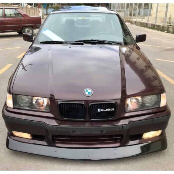 BMW kar van with Alpina badge ve BMW logos, araç modifikasyonu ve performans odaklı detaylar.
