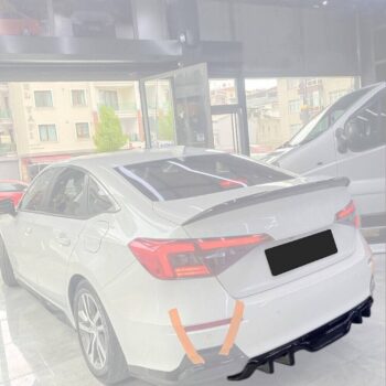 Yüksek performanslı otomobil modifiye servisi, aerodinamik spoiler ve body kit, MD Tuning Garaj, performans artırıcı araç parçaları.