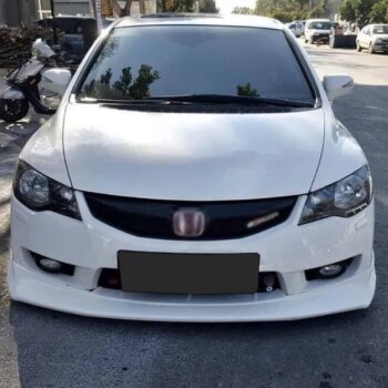 Araba modifiye edilmiş, performans ve estetik odaklı tasarım, MD Tuning Garaj logosu ve ön görünüm detayları.