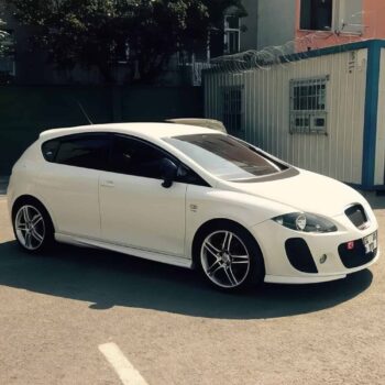 çok şık beyaz otomobil, performans ve tasarımıyla dikkat çekiyor, MD Tuning Garaj uzmanlığıyla modifiye edilmiş araç.