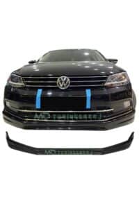 Araba ön görünümünde VW şık ön ızgara ve farlar, siyah renkli otomobil, MD Tuning Garaj logosu ve yan koruma çıtaları.
