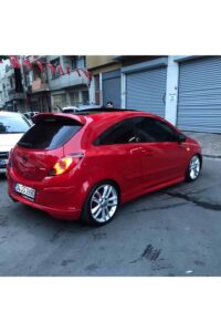 Araba modifiye ve tuning hizmetleri sunan MD Tuning Garaj, kırmızı Opel Corsa araç.